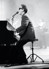 Musician singer composer Billy Joel is shown at a live concert app- Old Photo 5 picture