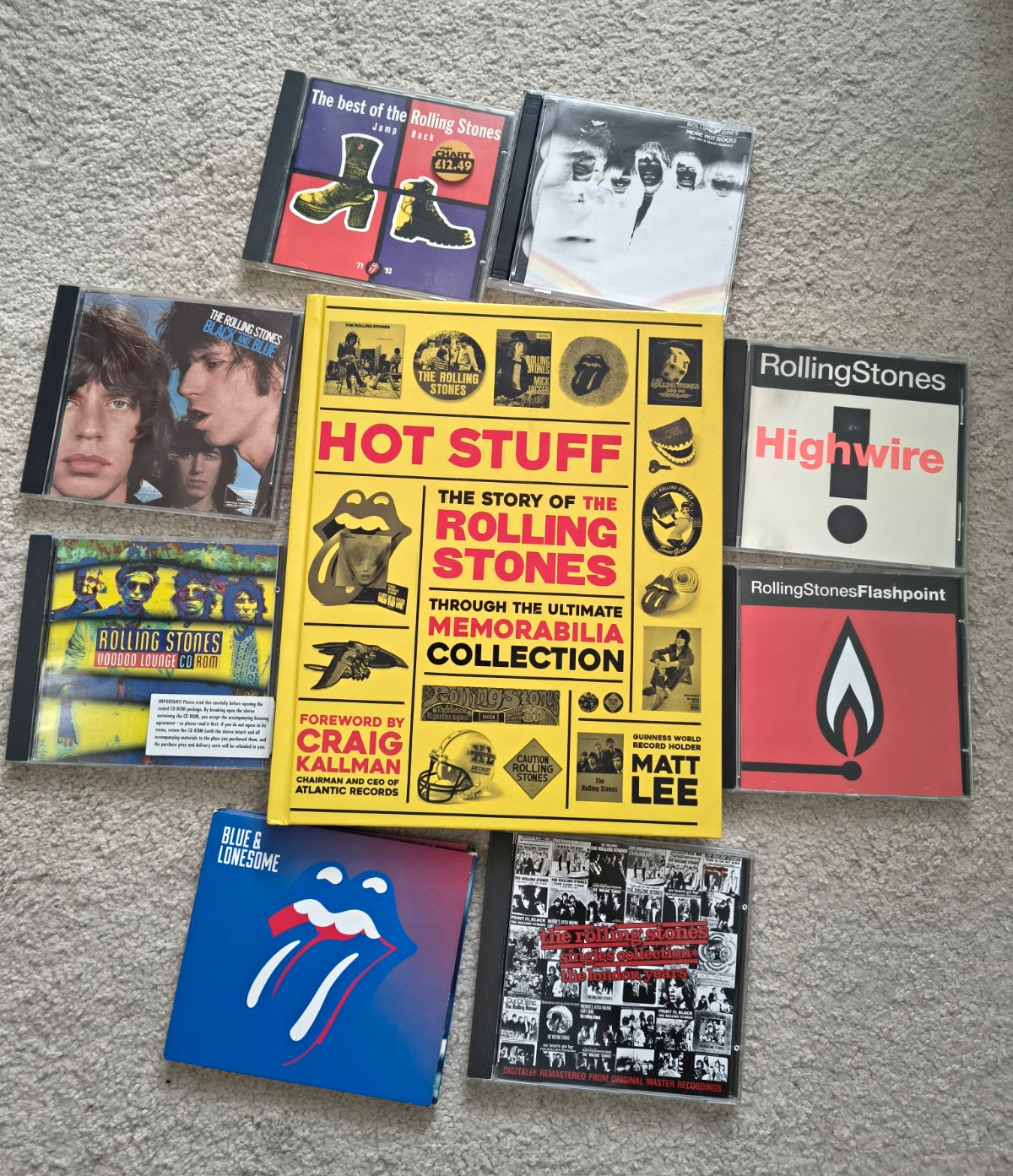 Rolling Stones Autographed Hot Stuff Memorabilia Book & Original CD Lot
