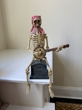 2010 Banjo playing skeleton sitting on tombstone Tested works Magic Power Co. picture