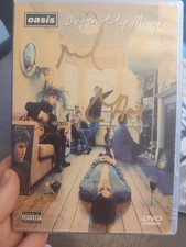 Oasis Definitely Maybe DVD signed By Noel And Liam picture