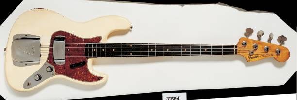 Studio still life of a 1960 Fender Jazz Bass guitar photographed U- Old Photo 1