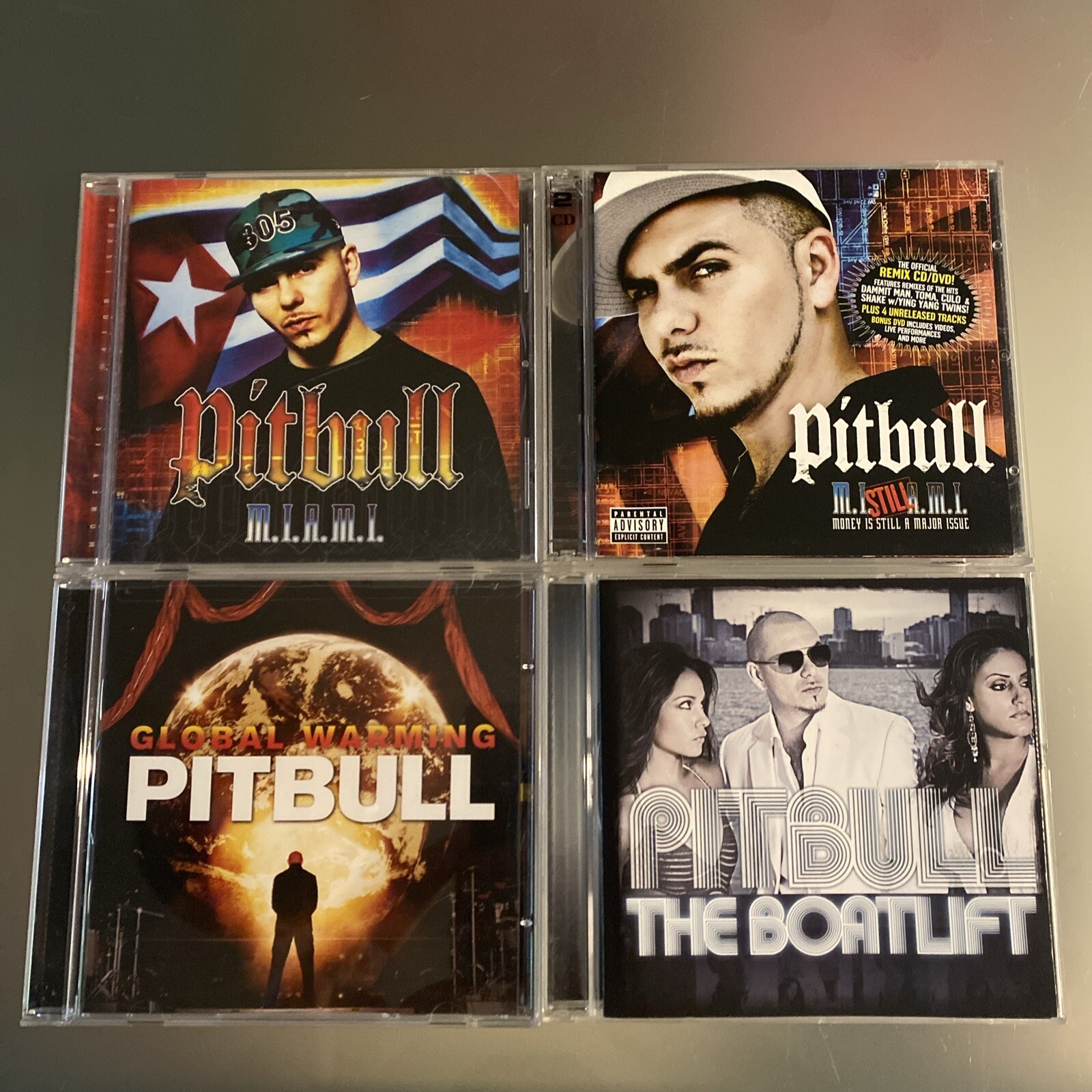 Pitbull 4 LOT: M.I.A.M.I. [Clean], Money (DVD ONLY), Boatlift, Global Warning VG