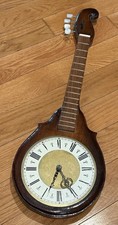 banjo-shaped novelty wall clock (not Working) picture
