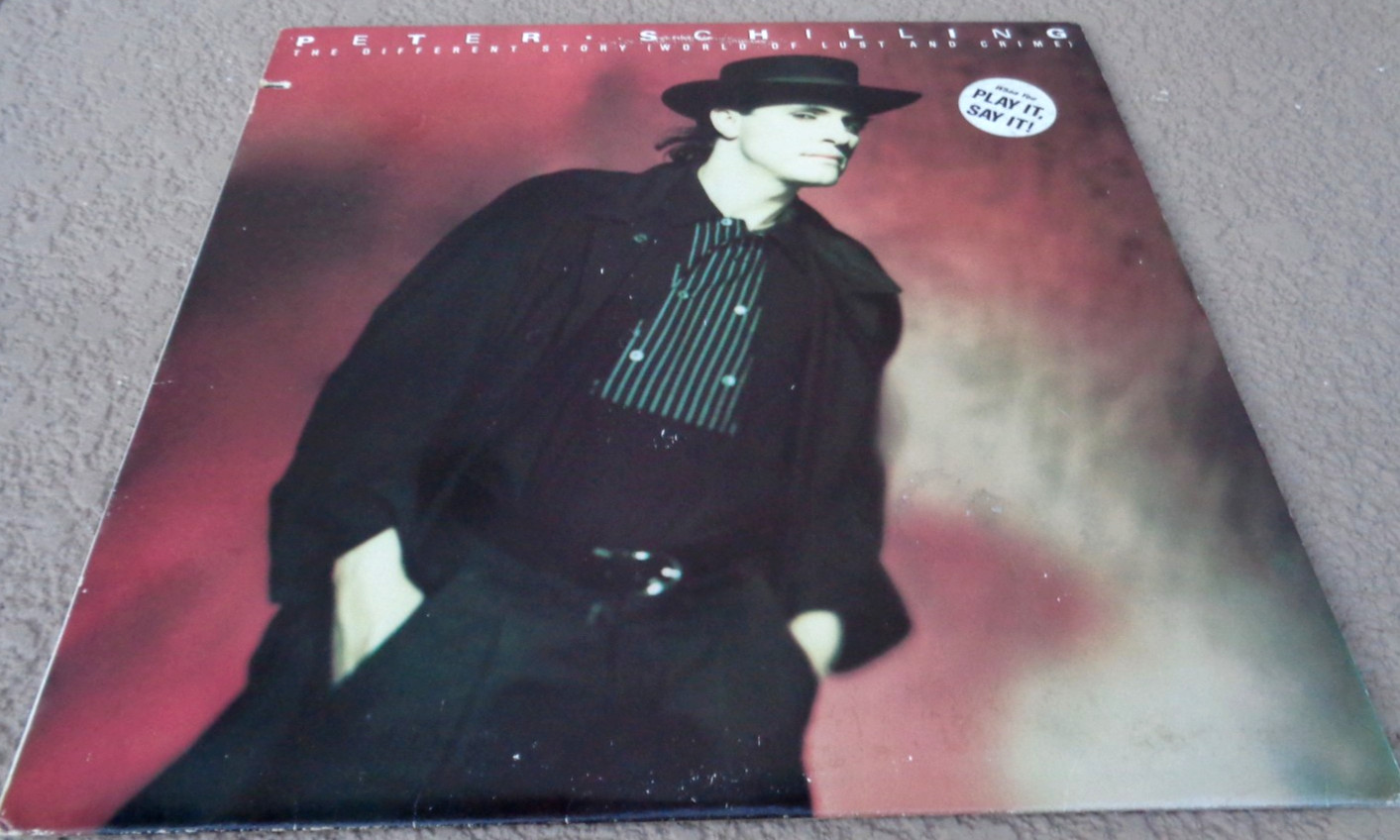 PETER SCHILLING DIFFERENT STORY WORLD LUST CRIME VINYL RECORD TESTED (ELEKTRA)