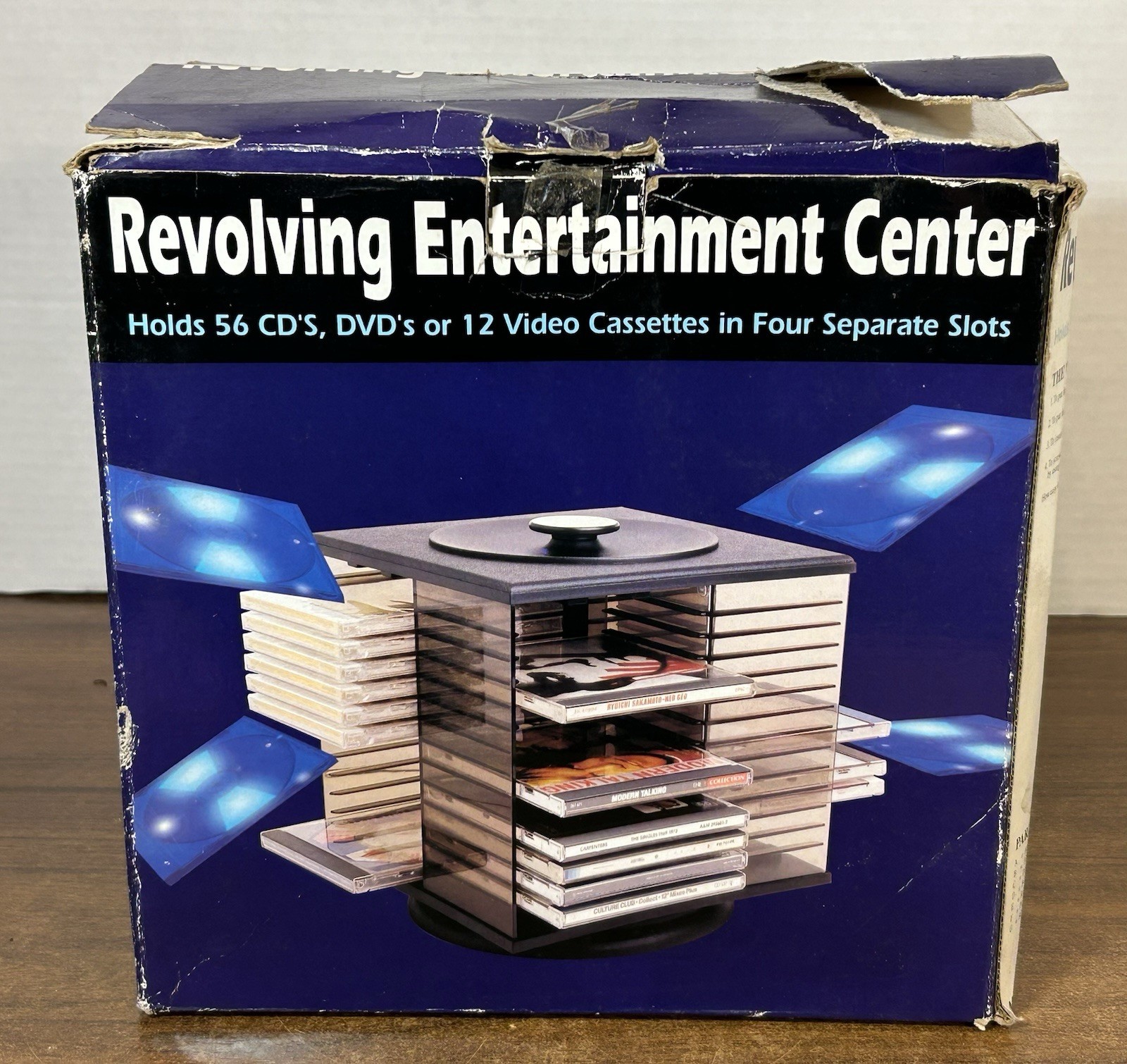 Vintage Revolving Entertainment Center 56 CD DVD Or 12 VHS Spinner New Open Box