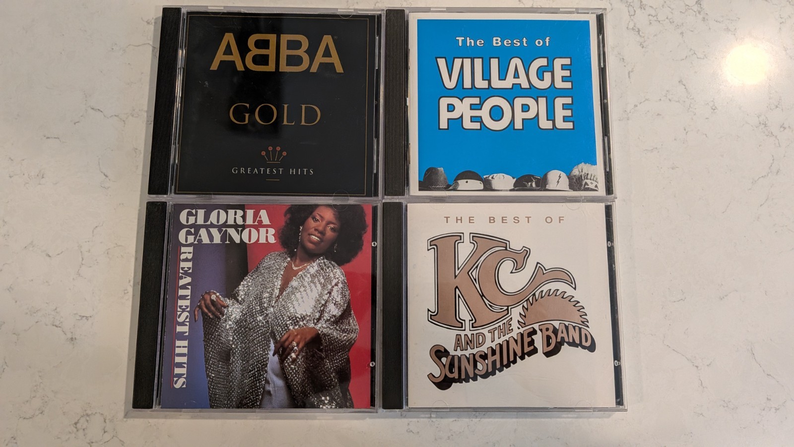 Disco Pop CD Lot of 4 ABBA Gold Village People KC Sunshine Band Gloria Gaynor
