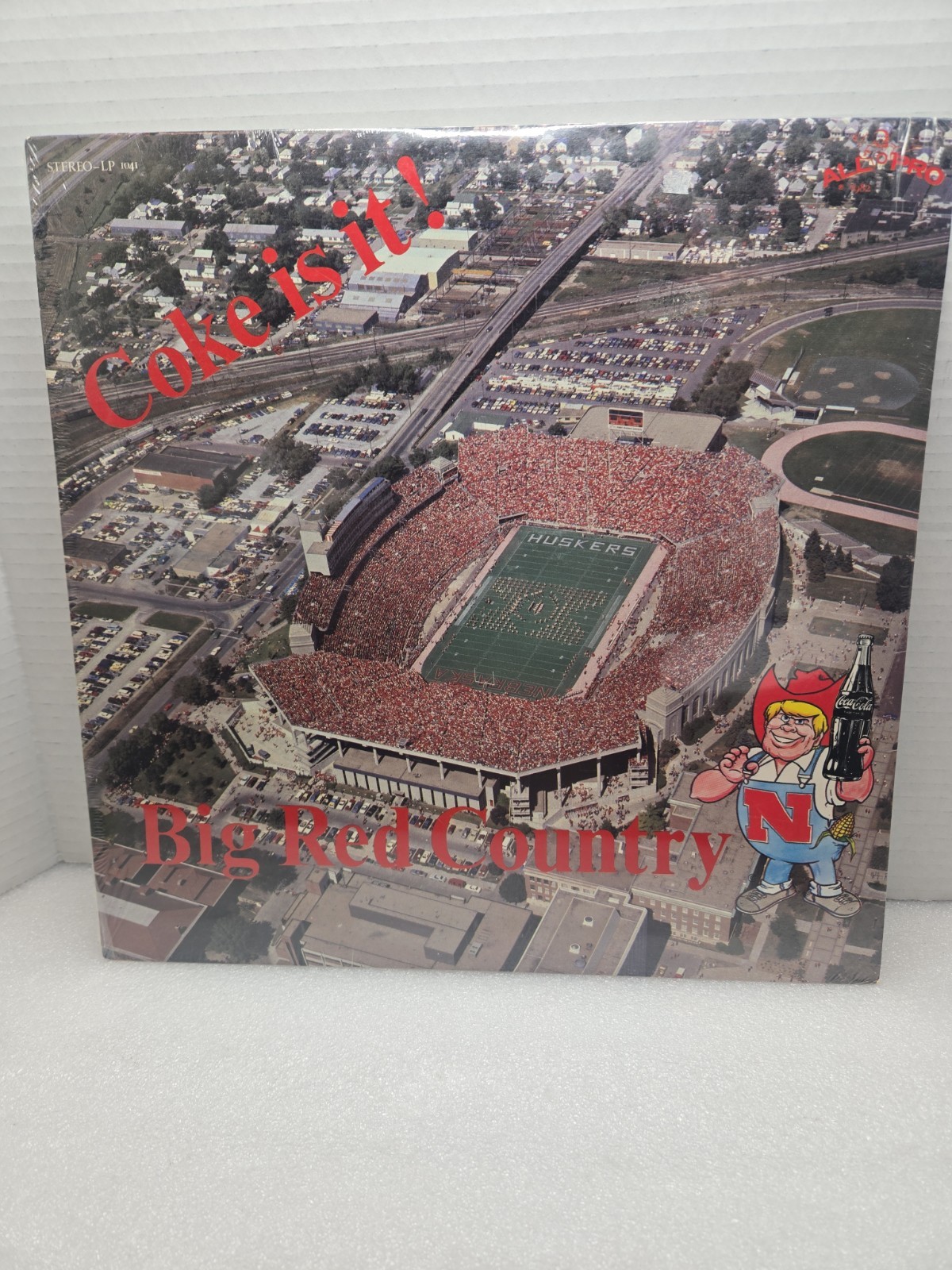 Vintage Nebraska Corn Huskers LP Album Coke Is It  Big Red Country 1982 New 