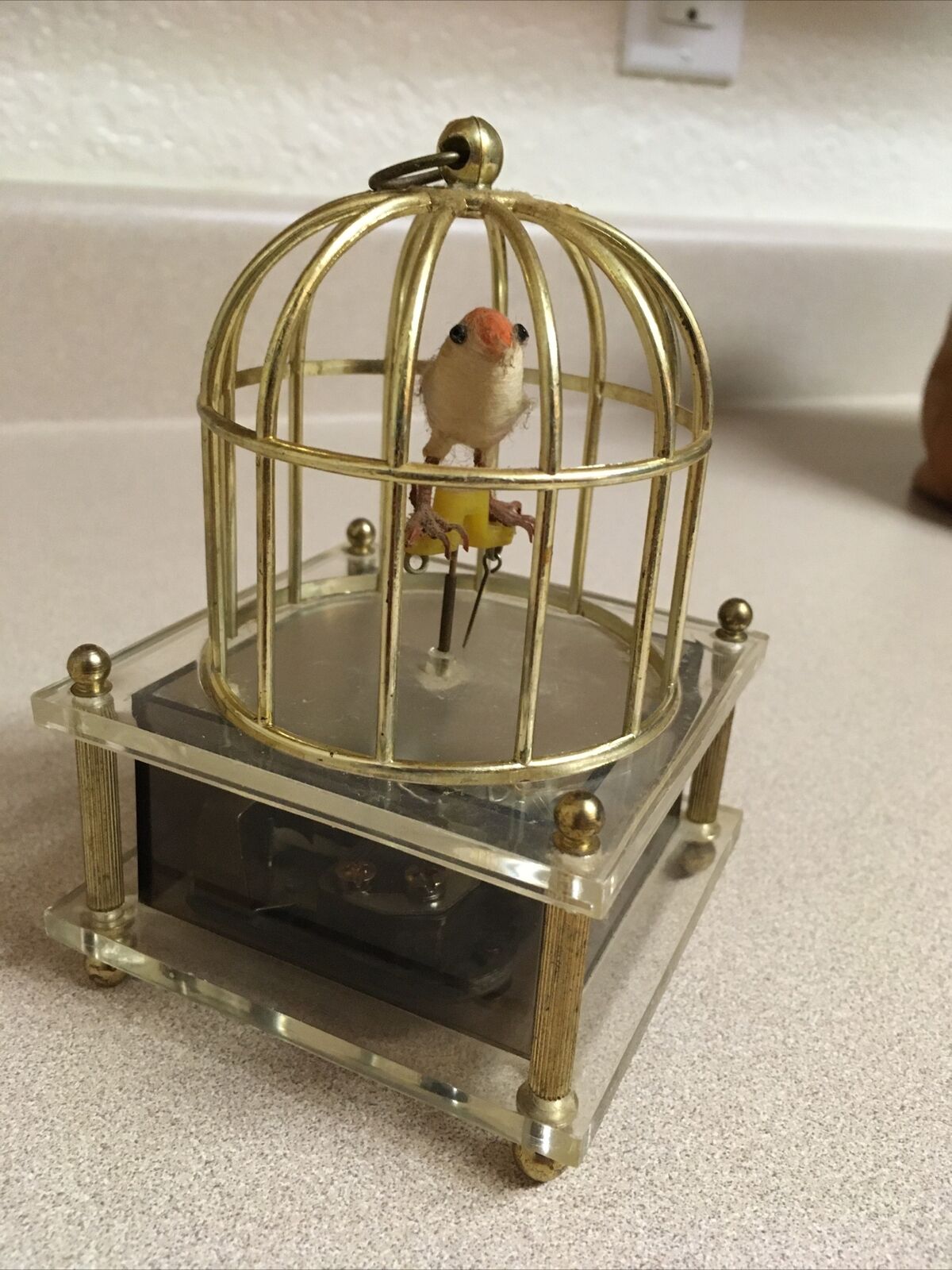 Vintage Bird in Cage Music Box Gold Brass Plastic On Plexi Box