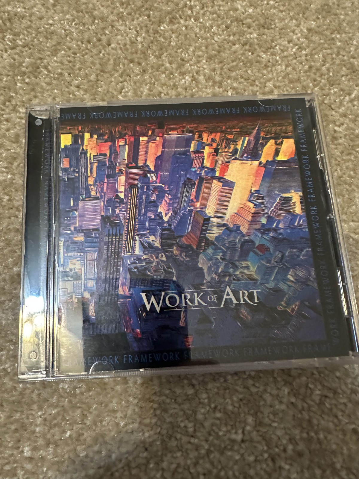 WORK OF ART FRAMEWORK CD, FRONTIERS, FRONT INSERT NICE, BACK INSERT WRINKLED