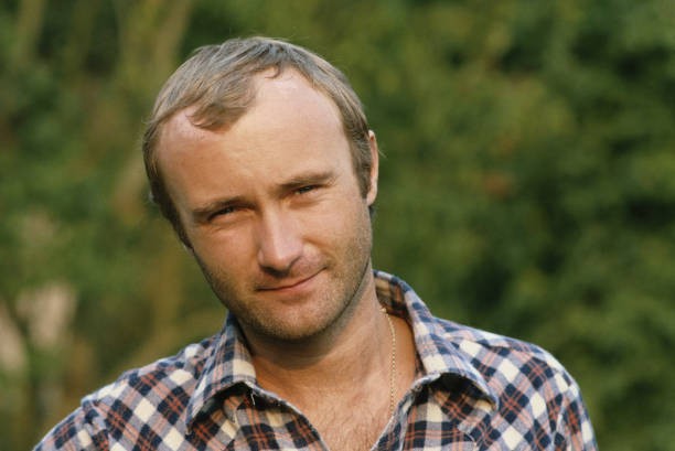 Singer drummer Phil Collins of British rock group Genesis during t- Old Photo