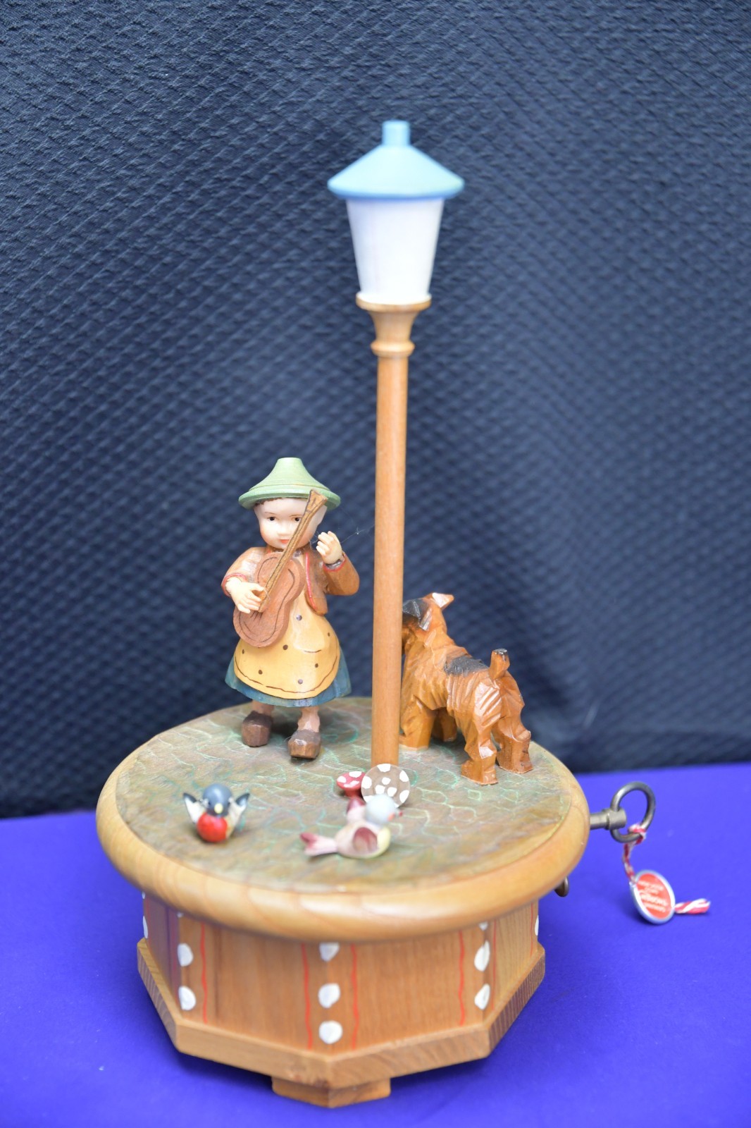 Vintage German Erzgebirge hand-carved wooden rotating forest music box