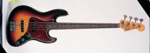 Studio still life of a 1960 Fender Jazz Bass guitar photographed U- Old Photo
