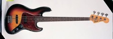 Studio still life of a 1960 Fender Jazz Bass guitar photographed U- Old Photo picture