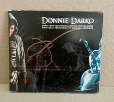 “DONNIE DARKO” SOUNDTRACK CD SIGNED BY STAR JAKE GYLLENHAAL (VG) w/COA picture