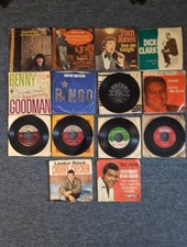 Lot of vintage 7-inch 45 RPM vinyl records W/sleeves featuring classic Artist  picture