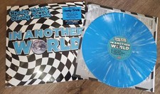 Cheap Trick - In Another World (Limited Edition Blue / White Splatter) Vinyl picture
