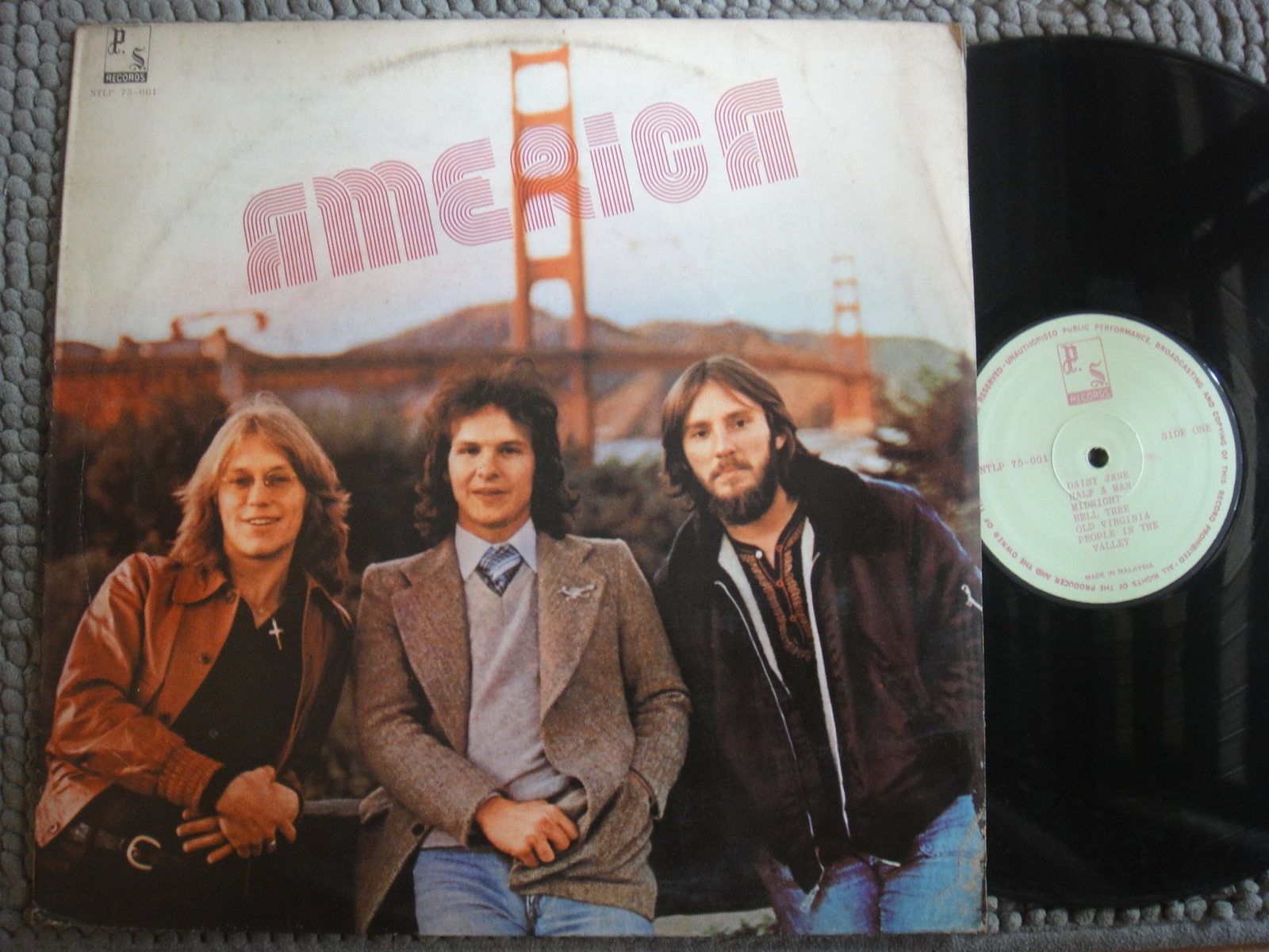 (877) Malaysia Unique LP - AMERICA