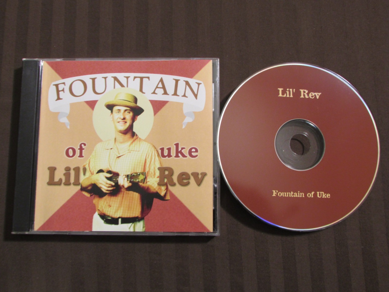 Lil\' Rev Fountain Of Uke 27 Trk CD: Alternate Trk Listing to 10th Anniversary Ed