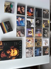 Collection of Eric Clapton including compact discs (CDs) Plus Clapton book 1991 picture
