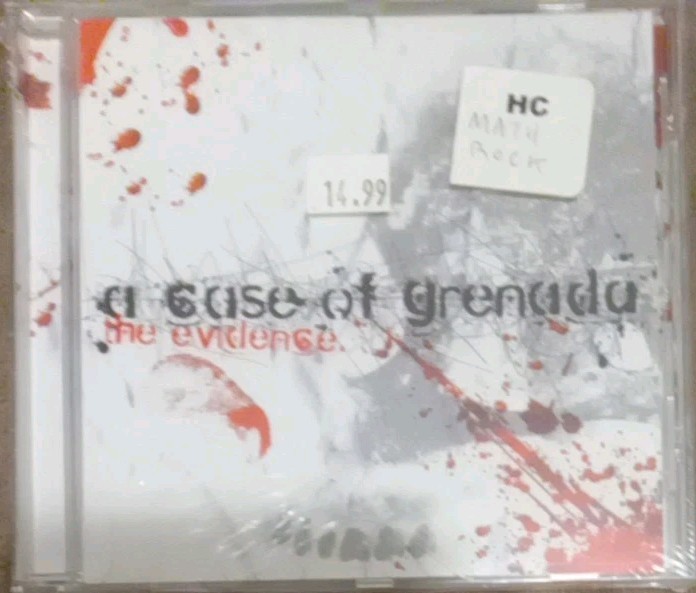 The Evidence - A Case Of Grenada - 9 Track CD - Sealed, But Not Factory 