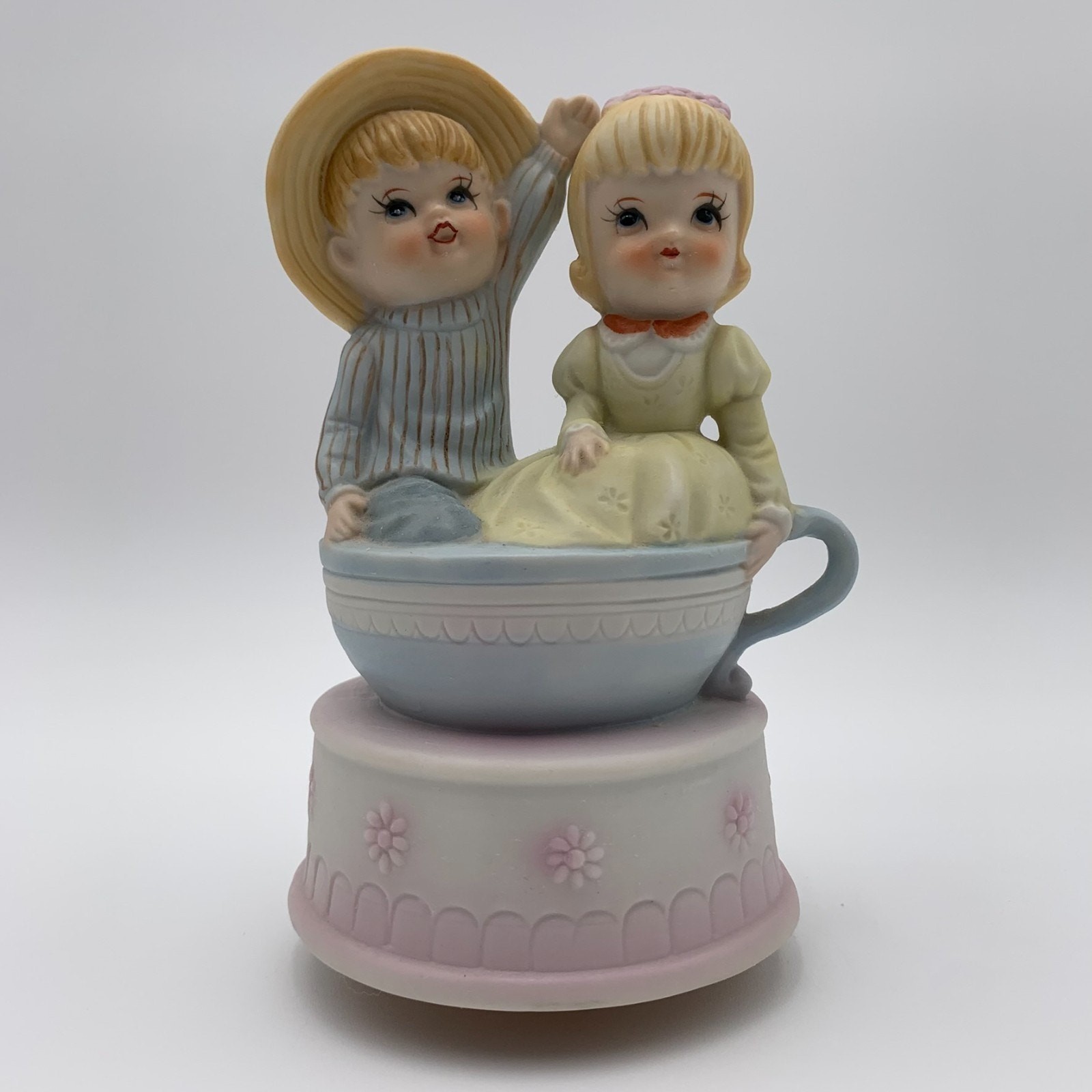 Vintage Music Box Boy Girl Sitting in Teacup Pastel Blue Pink Yellow Children
