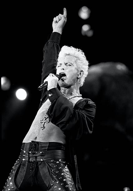 Singer Billy Idol is shown at a live concert appearance at Rock In- Old Photo 4