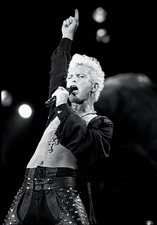 Singer Billy Idol is shown at a live concert appearance at Rock In- Old Photo 4 picture