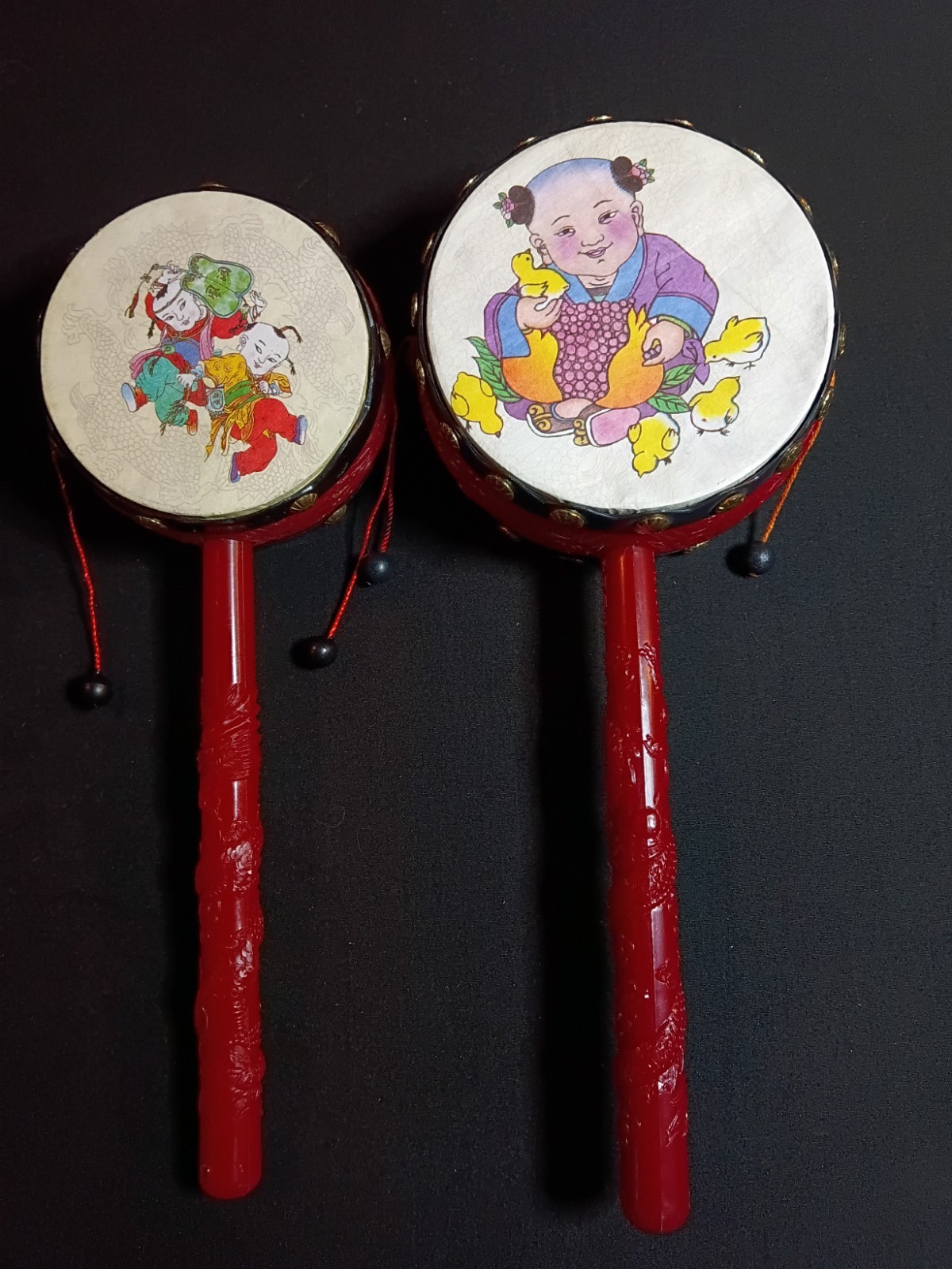 Pair of Chinese Rattle Drums Bolanggu Vintage Style Red Plastic Toy Drums 🪇🪇