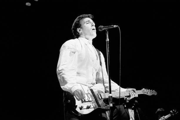 Bruce Springsteen plays a Fender Telecaster electric guitar, as he  Old Photo 3