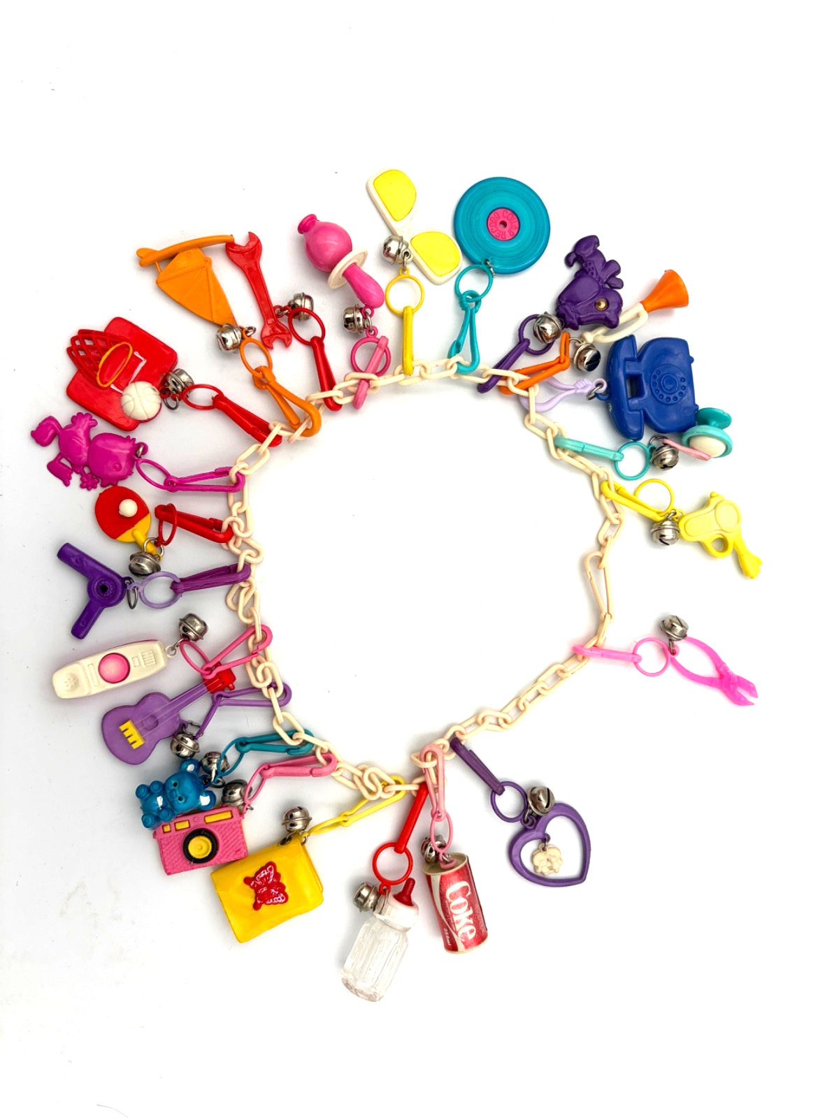 1980's Clip on Plastic Bell Charm Necklace 23 charms Coke Guitar Camera Record