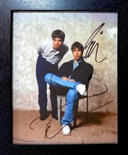 Oasis; Framed 25cm x 20cm Liam And Noel Gallagher Hand Signed Photo & COA picture