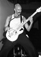 Bass guitarist Tony Levin is shown performing at a concert appeara- Old Photo 4 picture