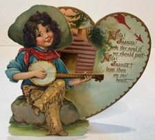 Valentine, Cowgirl plays banjo fold out, Tuck circa 1905 picture