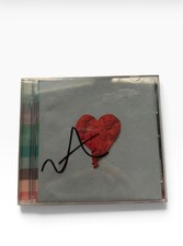 Signed kanye west 808s and heartbreak cd In good Condition picture