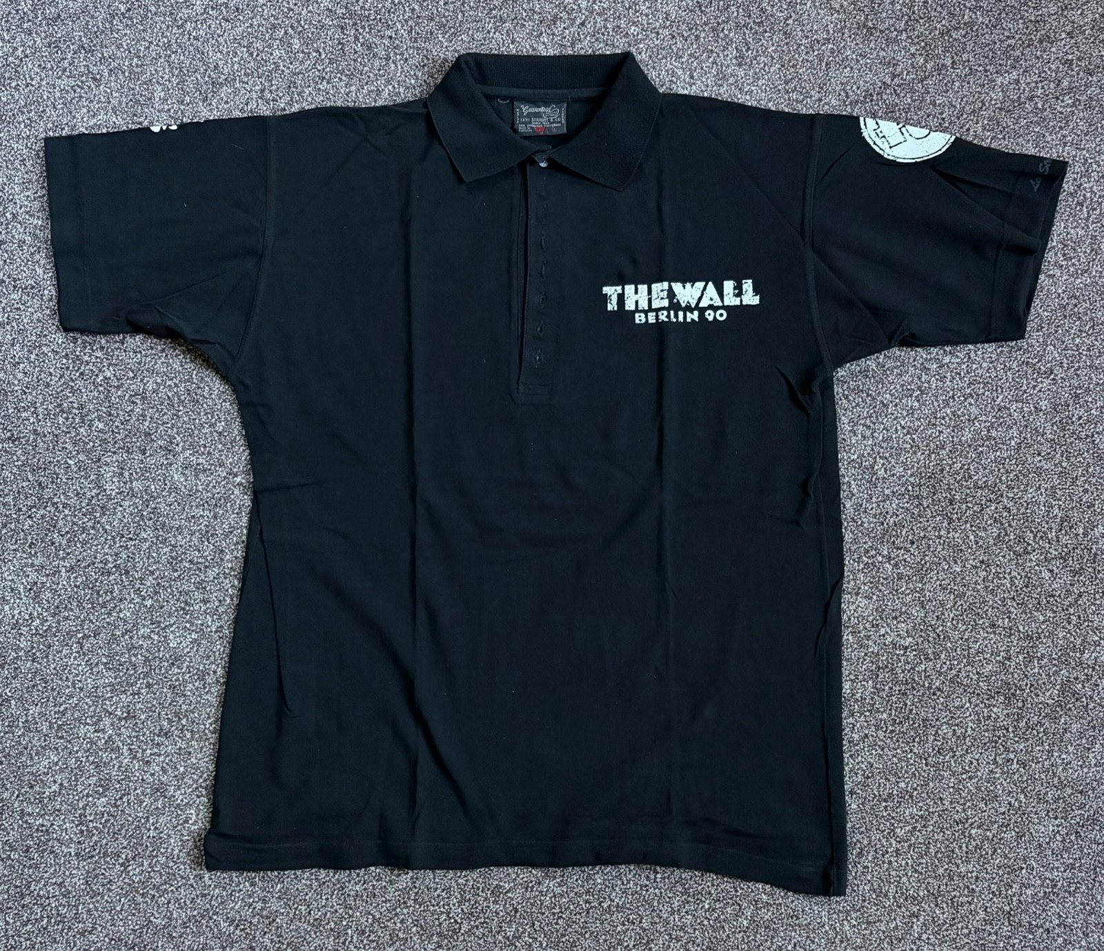 Very, VERY rare “THE WALL 1990” black polo shirt.  LEVI Size L - NEVER BEEN WORN