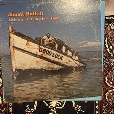 2 Jimmy Buffet Albums. Volcano And Living And Dying In 3/4 Time picture