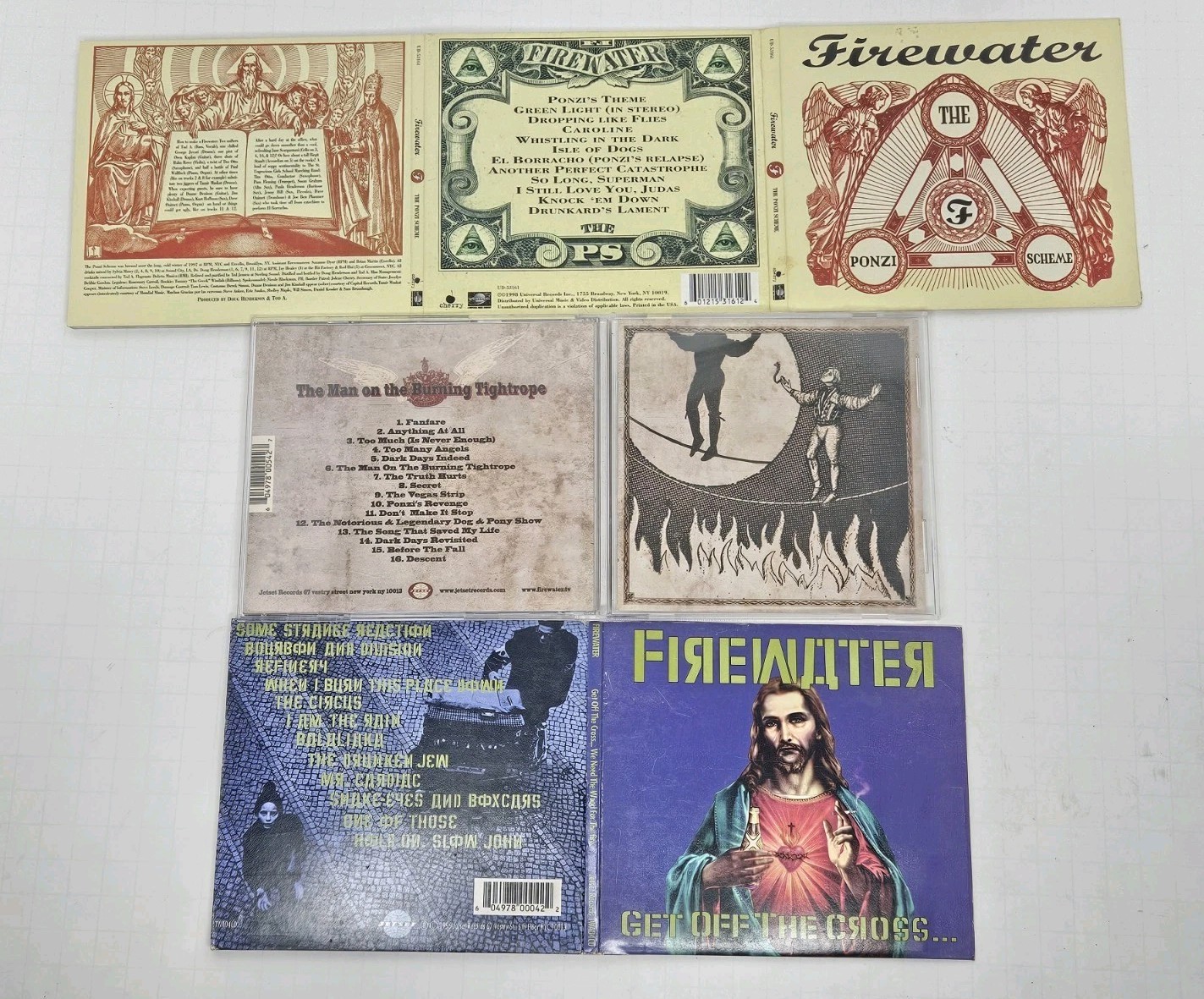 FIREWATER - The Ponzi Scheme, Man On The Burning Tightrope, Get Off The Cross Cd