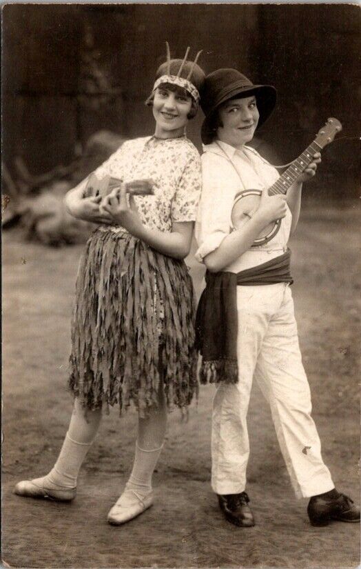 RPPC Postcard Characters Man & Woman Play Guitar Banjo Grass Skirt Hats    20636