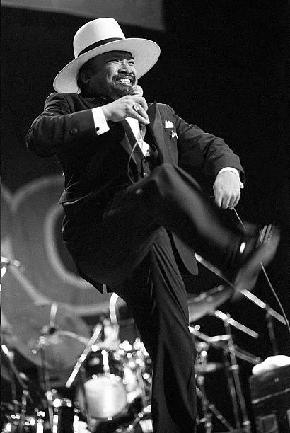Lead guitarist singer Larry Ramos Jr Is shown performing at a conc- Old Photo