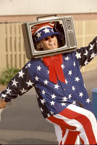 Mr Television Head is shown having fun while informing a concert c- Old Photo