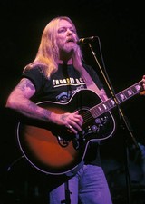 Musician singer Gregg Allman is shown performing at a concert appe- Old Photo 2 picture