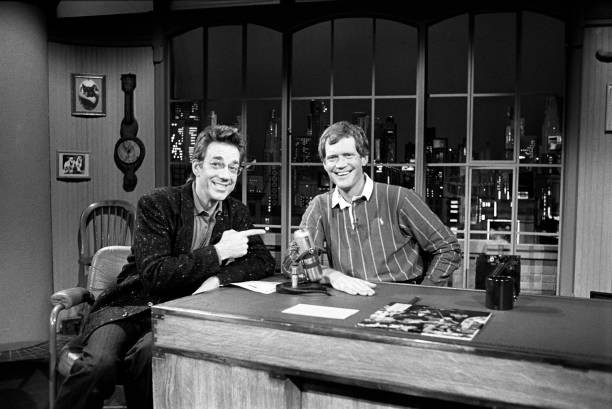 Keyboard player Ray Manzarek from the Doors posed with David Lette- Old Photo
