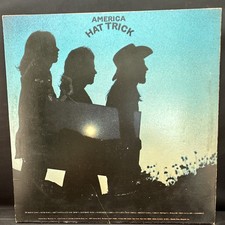 America Hat Trick LP 1973 Warner Bros NM Vinyl Original Poster Inner Sleeve picture
